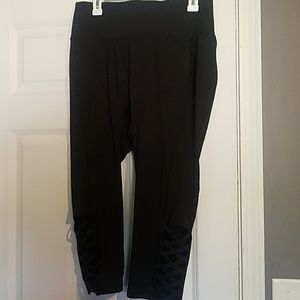 Black workout capri leggings with bottom crisscros